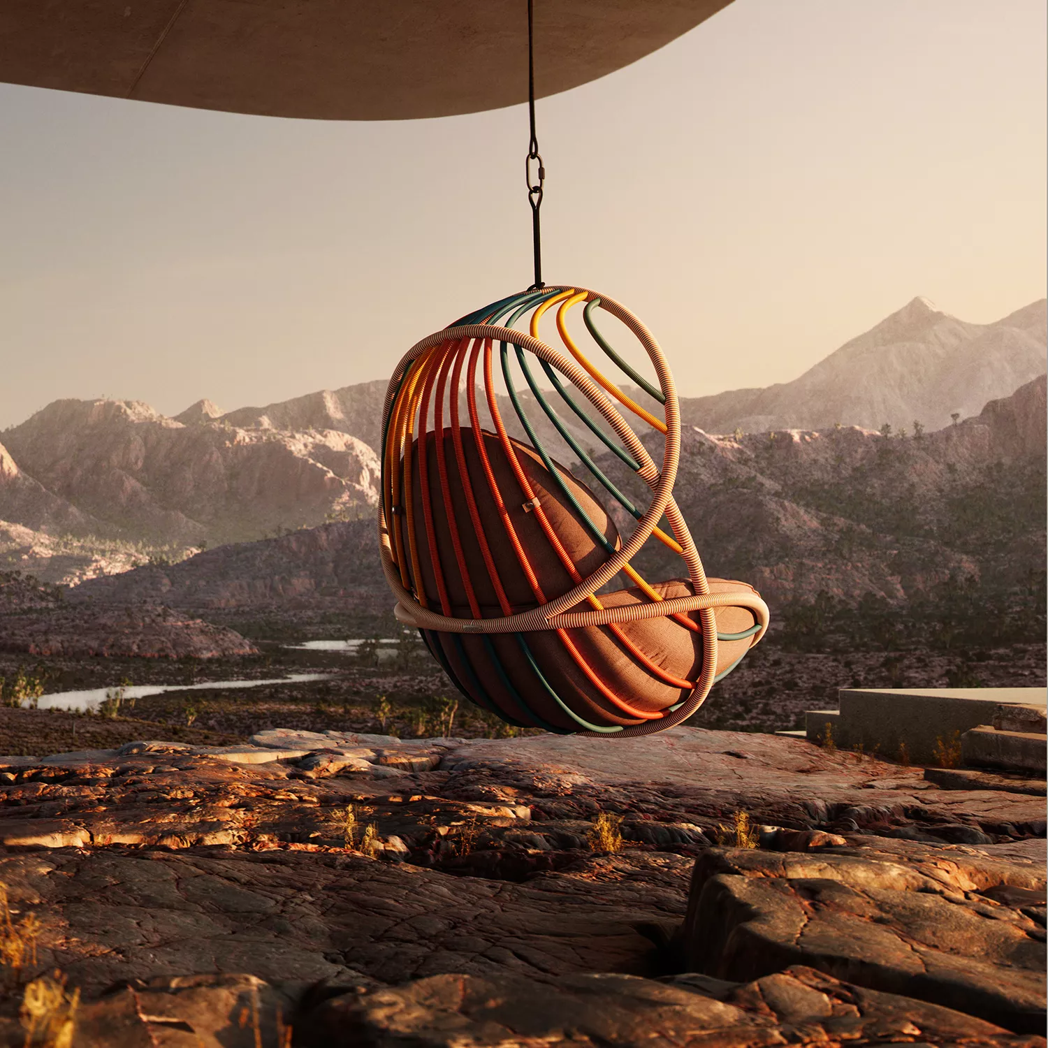 Dedon Kida Hängesessel in einer Berglandschaft bei Sonnenuntergang schwebend