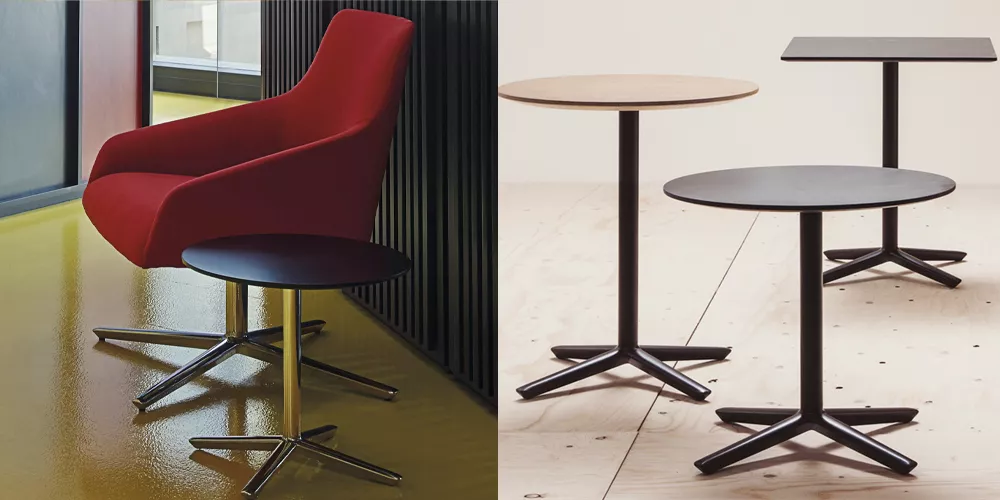 Andreu World Quattro Beistelltisch in Schwarz und Holzoptik, modernes Design, auf hellem Holzboden, neben rotem Sessel.