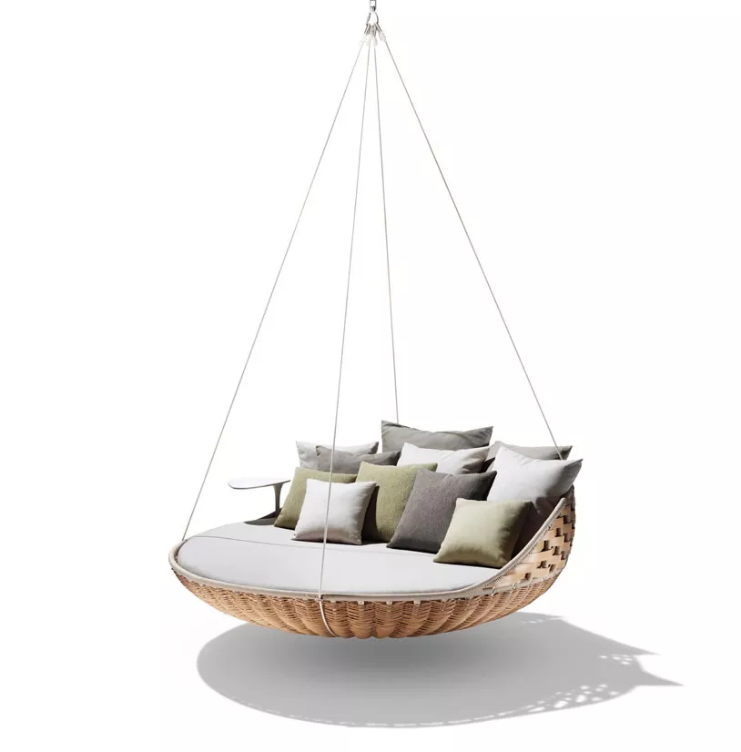 Dedon Swingrest Hanging Lounger in einem modernen Design mit mehreren Kissen in verschiedenen Farben ohne Hintergrund