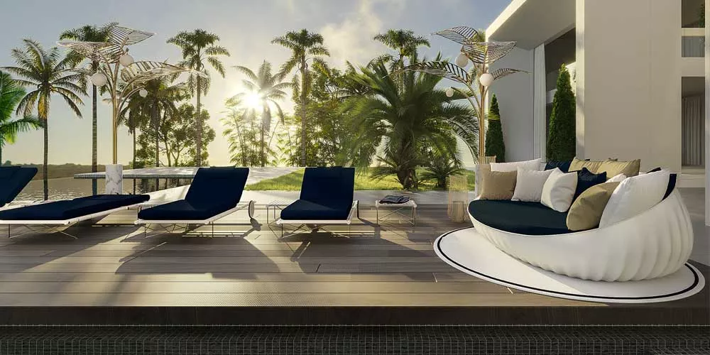 Mayface Noa Loungegruppe in Schwarz und Weiß auf einer Terrasse mit Palmen im Hintergrund, stimmungsvolles Bild bei Sonnenuntergang.
