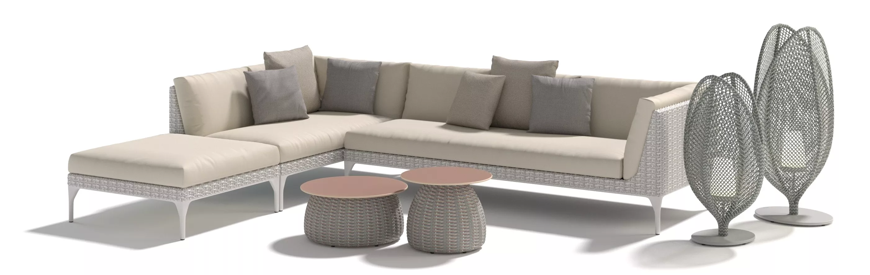 Dedon Mu Porcini Sofa-Set mit beigen Kissen und zwei runden Beistelltischen in einem modernen Outdoor-Setting ohne Hintergrund