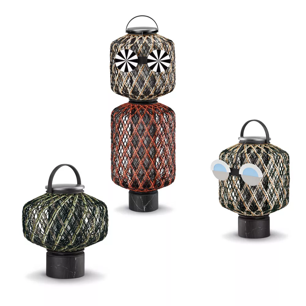 Drei Dedon The Others Gartenleuchten Laternen in verschiedenen Farben und Größen auf weißem Hintergrund