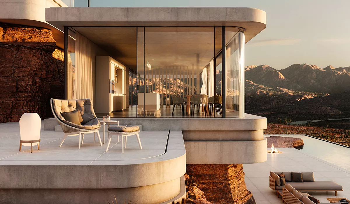 Dedon Loungesessel auf einer modernen Terrasse mit Blick auf Berge und See im Sonnenuntergang