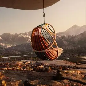 Dedon Kida Hängesessel in einer Berglandschaft bei Sonnenuntergang schwebend